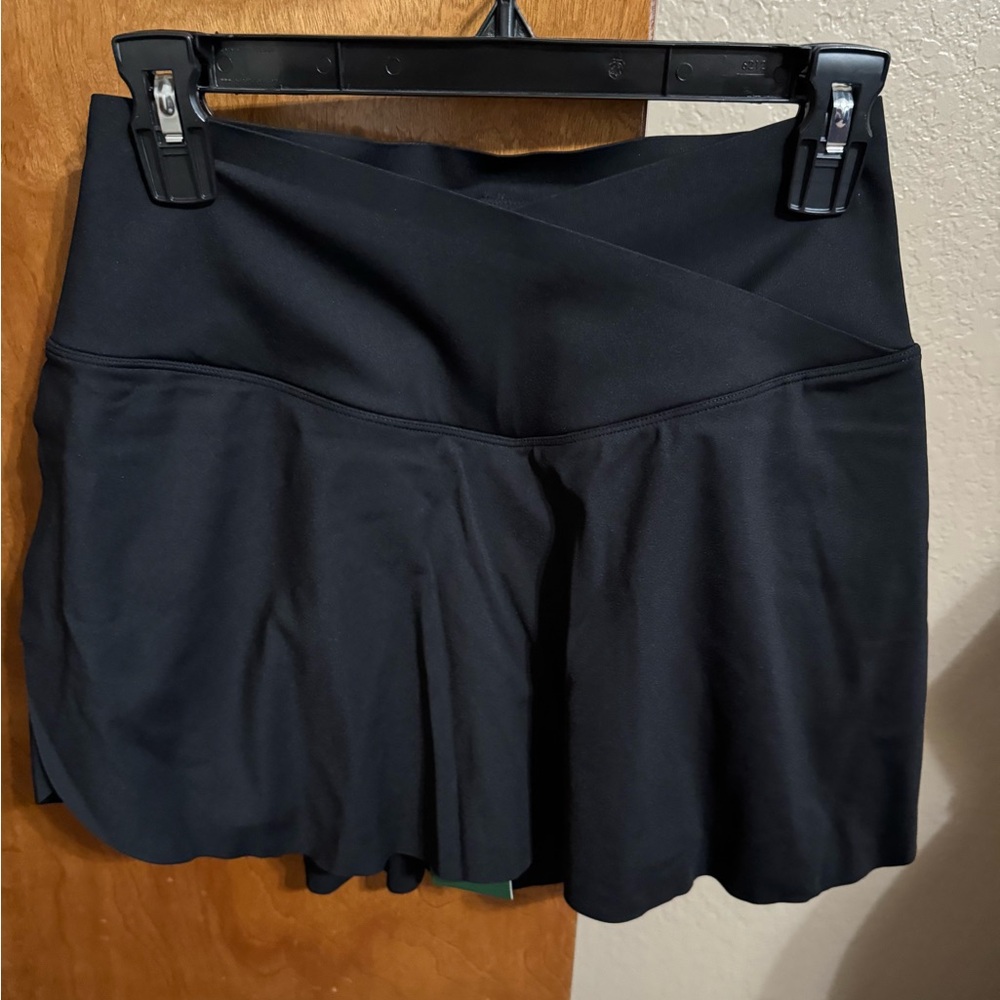 Halara SoftlyZero Airy crossover Tummy control tennis skirt.  NWT